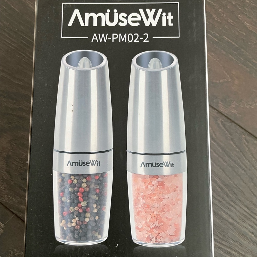 Gravity electric salt and pepper grinder set.